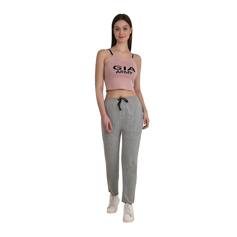 Female model in grey jogger pants and crop top - western wear ecommerce photography by Lohar Studio Delhi